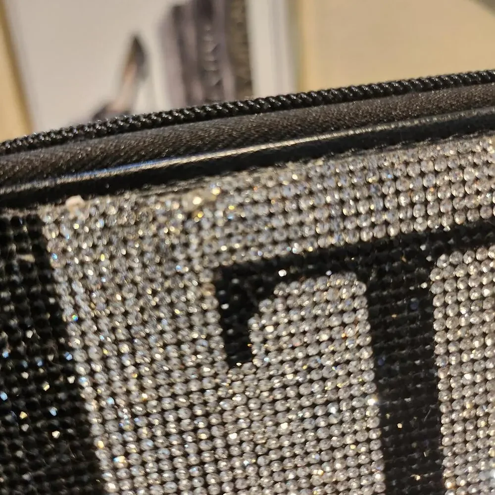 Tory Burch black leather wallet with silver rhinestone 'T' logo